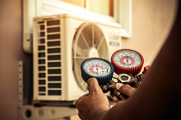 Professional Heat Pump Repair technician working in North Bay, NY